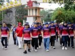 Gubernur Bengkulu, Rohidin Mersyah, Kepala BI Bengkulu, Darjana dan para pelaka jasa keuangan meningkuti kegaitan Bencoolen Fun Walk di Pantai Panjang, Minggu 18 Agustus 2024.(Foto-Humas Pemprov Bengkulu)