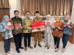 Sekda Provinsi Bengkulu, Isan Fajri bersama pejabat BPJS meluncurkan produk layanan baru Bank Bengkulu tabungan haji dan umroh, Senin 11 November 2024.(Foto-Humas Pemprov Bengkulu)