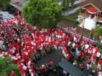 Kirab Bendera Merah Putih yang digelar dalam tangka memeriahkan HUT Kemerdekaan RI ke-80 tahun 2025 di Bengkulu, diikuti ribuan masyarakat.(Foto/Ist)