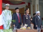 Upacara HUT TNI Gubernur Bengkulu, Helmi Hasan (paling kanan) menghadiri upacara HUT TNI ke-80 tahun 2025 di halaman rumah dinas Gubernur Bengkulu, Balai Raya Semarak, Minggu 5 Oktober 2025.(Foto/Ist)